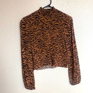 Mid length flows top with high neck